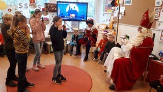 groep 7 speel mondharmonica